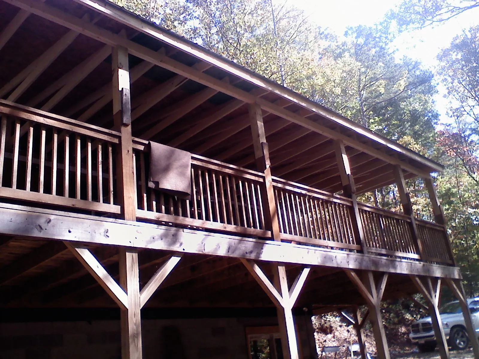 Timber framing under a new elevated porch and deck — Roof Leak Repair in Penn Yan by Roofing Brothers